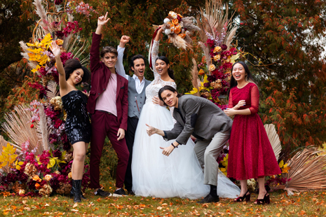 full-shot-people-posing-wedding.jpg